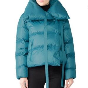 Bacon teal colored down filled puffer jacket. Size large.